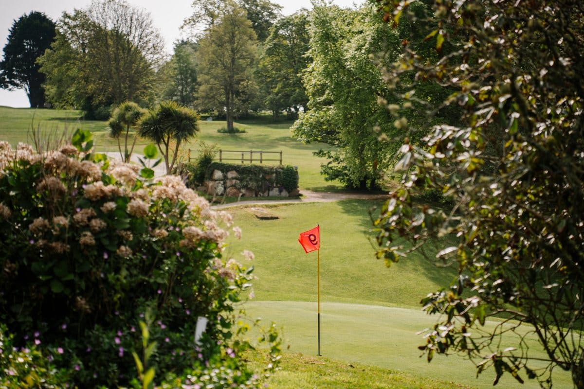 golf course in cornwall with golf flag