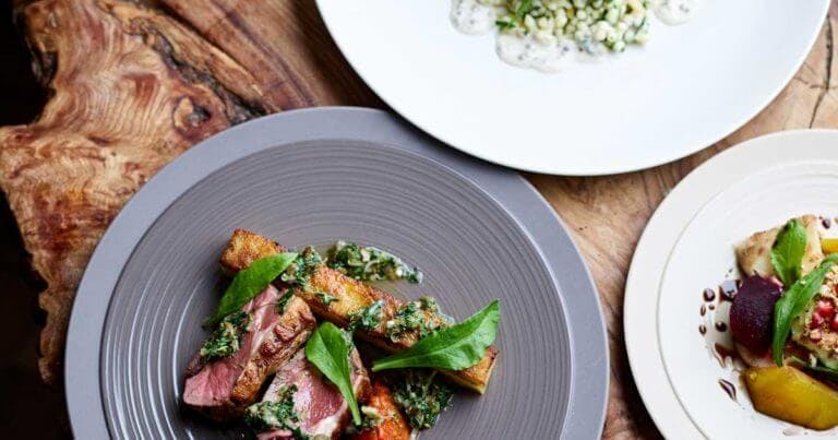 Close up of meat dish on wooden table