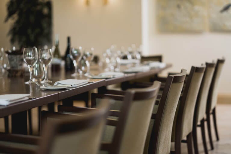 Room set up for conference with large table 