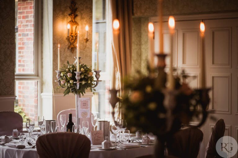 Wedding table set with candles and flowers