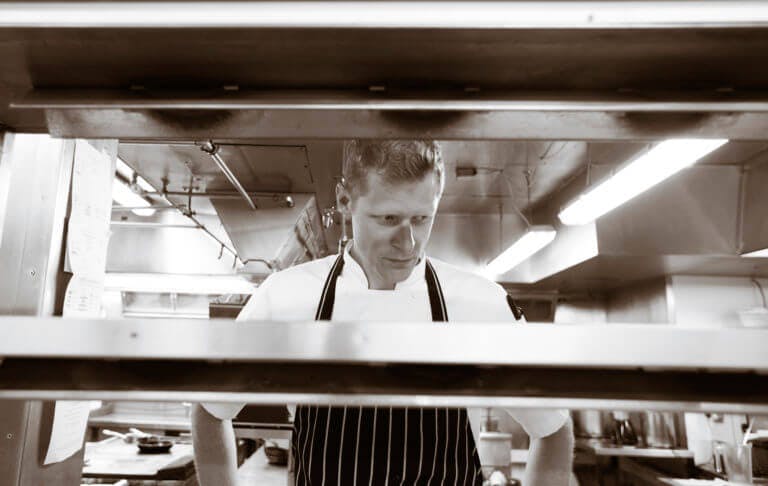 Head Chef, Alistair Craig in the kitchen at Careys Manor Hotel
