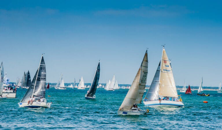 Sailing Regatta in the sunshine several boats are shown racing