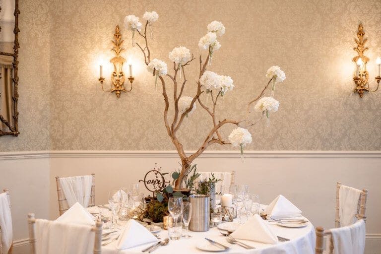 Close up of a table set for the wedding breakfast