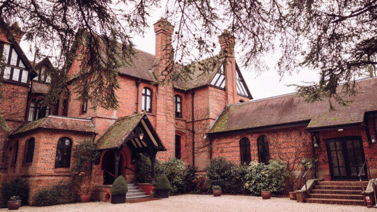 Exterior shot of Careys Manor Hotel