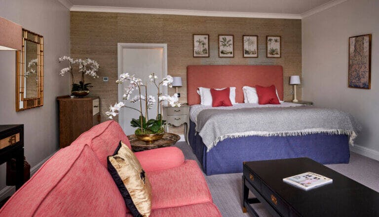 An open plan suite at Careys Manor Hotel with Thai style decor.