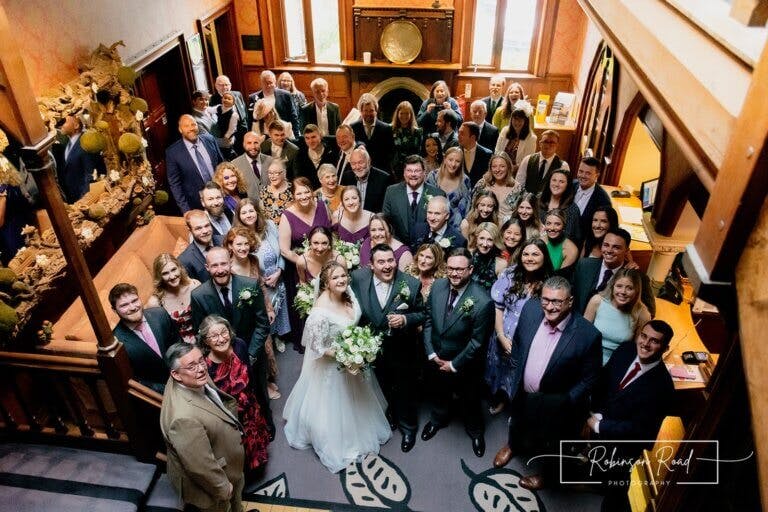 Wedding party celebrates in reception at Careys Manor Hotel & SenSpa wedding venue in The New Forest