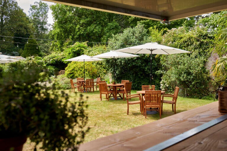 Outdoor dining at The Neigh Bar, Careys Manor Hotel & SenSpa