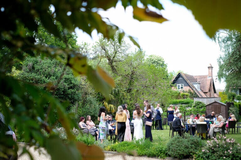 Guests enjoy chatting in the garden
