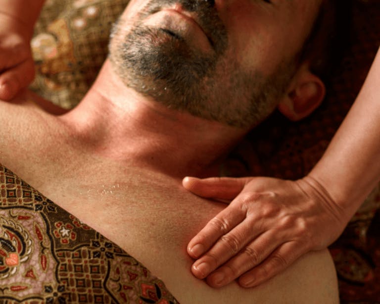 Man receiving spa massage treatment