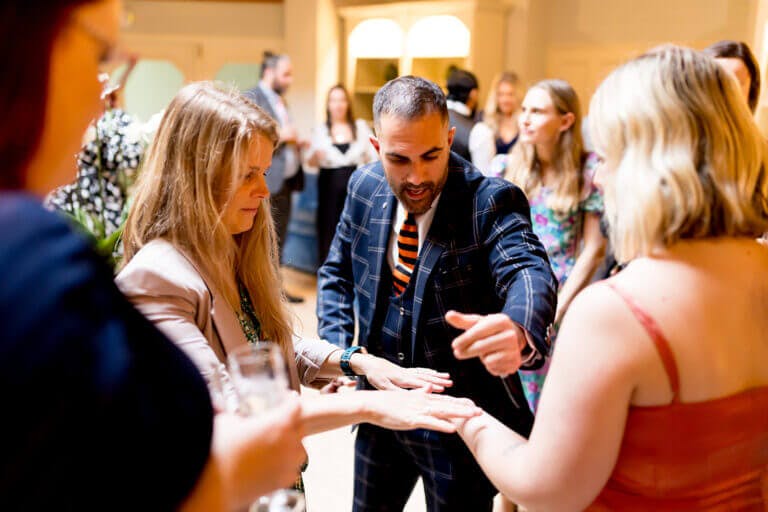Wedding guests at wedding in Careys Manor Hotel