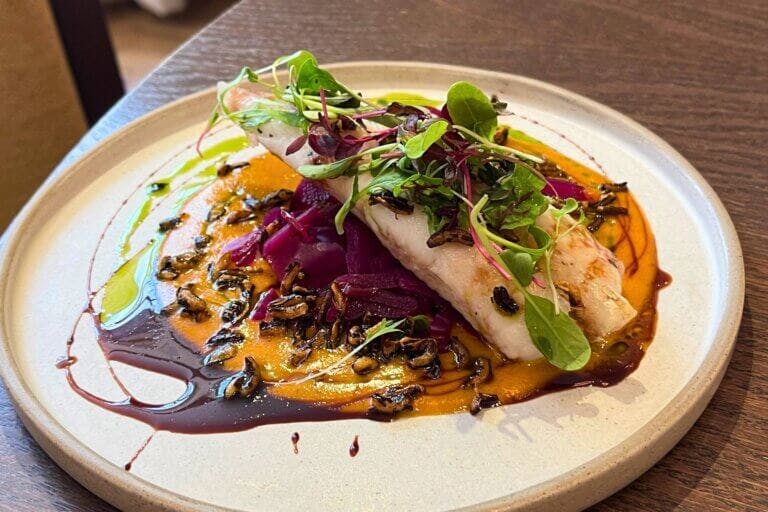 Starter at New Forest restaurant Cambium. Grilled monkfish, masala sauce, pickled red cabbage, puffed wild rice £13.50