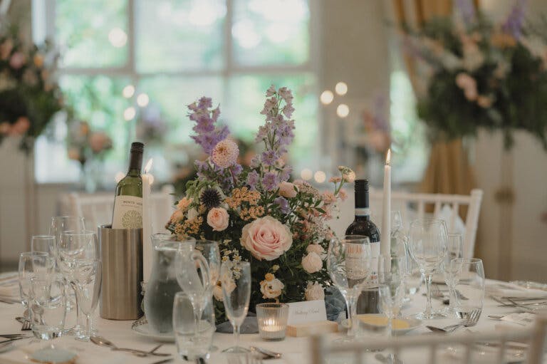 Table centre pieces - low pink and purple decoration