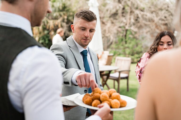 Guests enjoy canapes