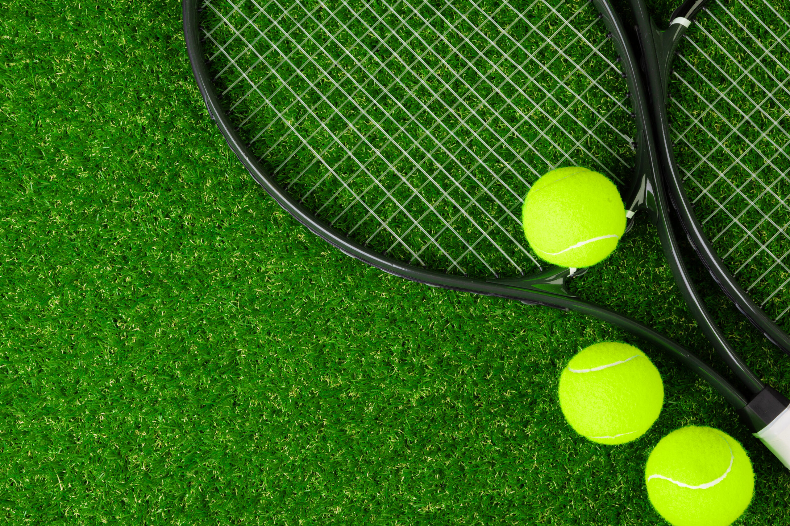 tennis balls on grass close up tennis equipment 2021 11 03 17 29 46 utc