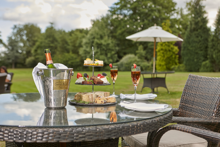 Burnham Beeches Hotel About Us Outside table image | The St James Hotel