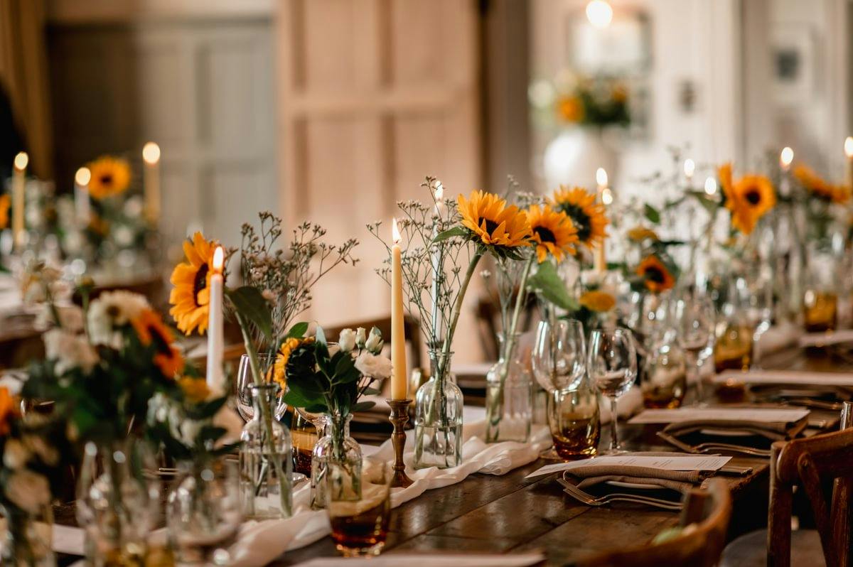 The Restaurant Space wedding reception banquet set with delicate florals and valley natural lighting