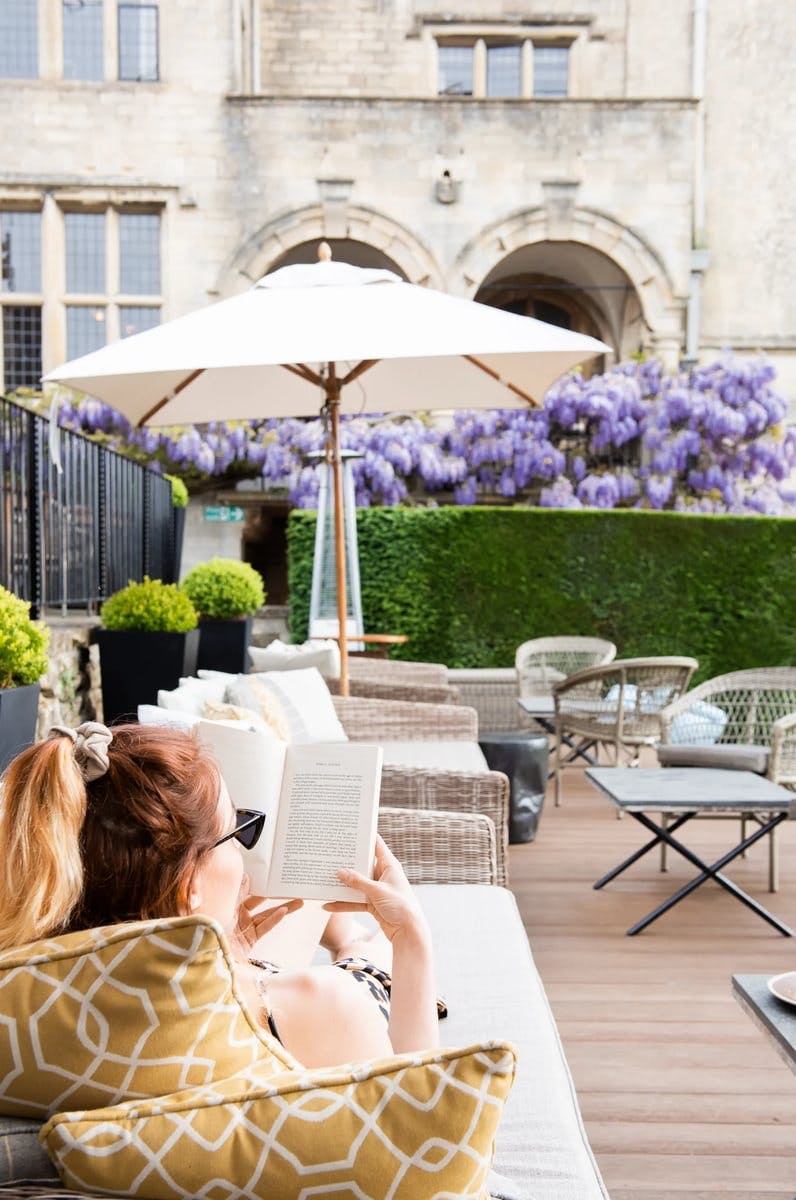 Terrace room direct ground-floor access leading onto Italianate stone terrace with outdoor seating